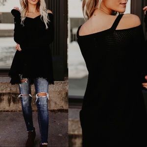 Cold shoulder black fringe sweater